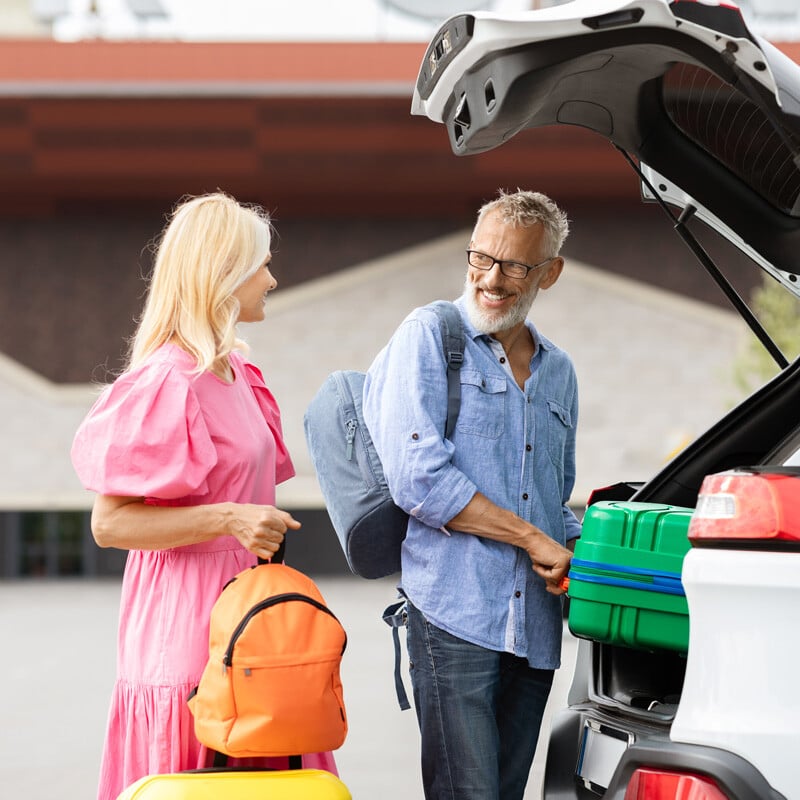 Couple-Traveling-Unloading-Car