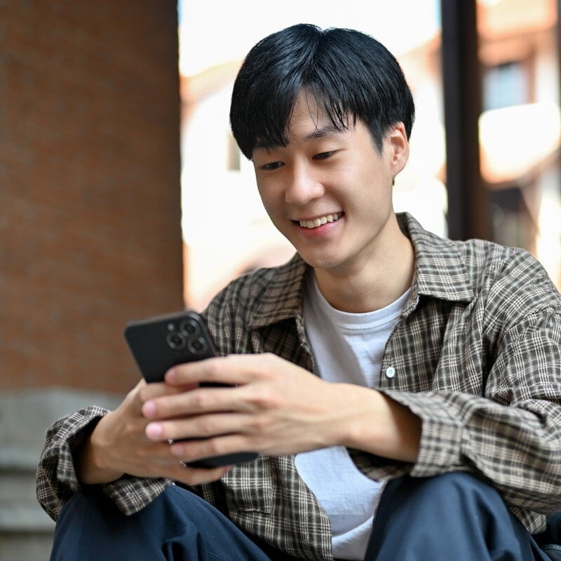 young-man-looking-at-phone