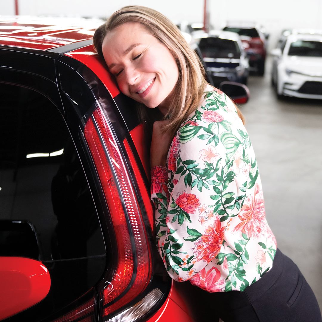 Standing by car