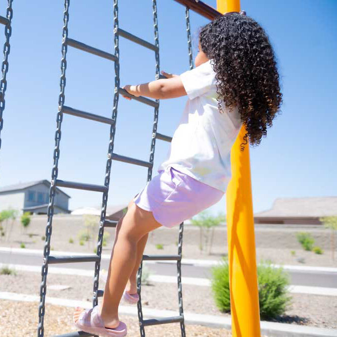 Kid playing on playground